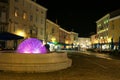 Cres city bay on cres island at night colorful Fontana Jadren fountain