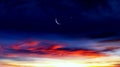 Crescent moon with beautiful sunset background . Generous Ramadan .