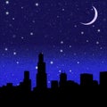 Crescent Moon and black starry sky over city