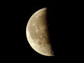 Crescent moon close up with shadows and craters. Royalty Free Stock Photo