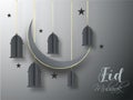 Crescent moon and hanging paper cut lanterns decorated on grey background for Eid Mubarak.