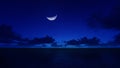 A crescent moon in the night over the ocean