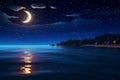 Crescent moon over the sea, stars, and a tranquil night