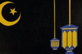 Crescent moon, star and lantern decoration with text on wooden blocks flat lay. Ramadan Kareem celebration. Royalty Free Stock Photo
