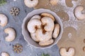 Crescent shaped christmas cookies called `Vanillekipferl`, a traditional Austrian or German Christmas biscuits with nuts