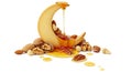 Crescent shaped cookie with honey dripping onto a pile of assorted nuts on a white background Royalty Free Stock Photo