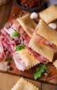 Crescentina. Food of Emilia Romagna region, deep fried bread gnocco fritto or crescentina. Starter or aperitif in Italy Royalty Free Stock Photo