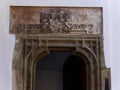 Crest above ancient, carved door, Sibiu, Romania Royalty Free Stock Photo