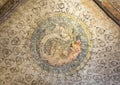 Crest with a cheetah or leopard painted on the ceiling vault of the Ring Room in the Fortress of Vignola, Italy. Royalty Free Stock Photo