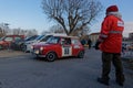 Historic Monte-Carlo Rally marshall and a Mini Cooper