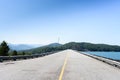 The crest road of the dam in perspective view Royalty Free Stock Photo