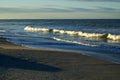 Cresting waves at sunrise gulf of mexico at dawn