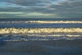 Cresting waves at sunrise gulf of mexico