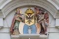 The crests of Lucerne and the Imperial Eagle flanked by St Leodegar and St Maurice, church of St. Leodegar in Lucerne
