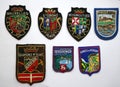 Crests, patches, coats of arms. Souvenirs from France, Belgium and Germany. Colorful, shiny and elaborately embroidere