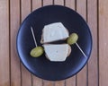 Cretan barley rusks with local gruyere cheese and green olives