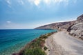 Cretan road along the coast of Crete island with beautiful lagoon and mountains Royalty Free Stock Photo