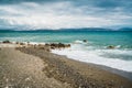 Crete, Greece. beach with rocks and cliffs with view towards sea ovean on a sunny day. Royalty Free Stock Photo