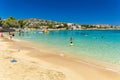 CRETE, GREECE - JULY 01 2023: Beautiful sandy beach and clear, shallow waters of Marathi near Chania in Western Crete (Greece