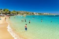 CRETE, GREECE - JULY 01 2023: Beautiful sandy beach and clear, shallow waters of Marathi near Chania in Western Crete (Greece