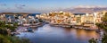 CRETE, GREECE - JULY 10 2023: The lake and harbour area of the town of Agios Nikolaos at sunset (Lasithi, Crete, Greece
