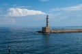 Crete Greece. Lighthouse, beacon at Venetian harbour in Old Town of Chania. Sunny day