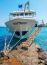 Crete, Greece - view of a boat anchoring at Mediterranean bay