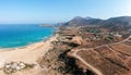 Crete island Greece. Aerial drone panoramic view of Falasarna beach, greenhouse, vast sea, blue sky Royalty Free Stock Photo