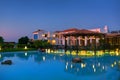 CRETE ISLAND, GREECE, JULY 01, 2011: Night view on Royal Mare Village restaurant for tourists and guests. Classical Greek hotel ar Royalty Free Stock Photo