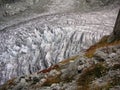 Crevassed glacier under the rock