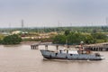 Crew delivery and supply ship on Long Tau River, Phuoc Khanh, Vietnam