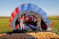 Crew of a hot air ballon preparing before flight at the festival of aeronautics in Pereslavl-Zalessky