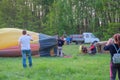 Crew inflate hot air balloon in forest meadow in Ukraine, Europe Royalty Free Stock Photo