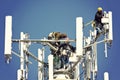 Crew installing antennas Royalty Free Stock Photo