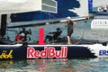 Crew of Red Bull Sailing Team adjusting sail at Extreme Sailing Series Singapore 2013