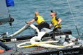 Crew of SAP Extreme Sailing Team steering boat at Extreme Sailing Series Singapore 2013