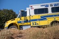 A crew transport truck from Ventura County Fire Department arrives at the scene of a brush fire