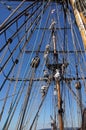 Crew unfurls a sail on a yardarm Royalty Free Stock Photo