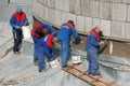 Crew of workers repairing historical building