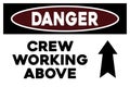 Crew working above warning sign Royalty Free Stock Photo