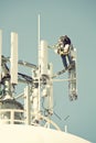 Crew working on the cell tower Royalty Free Stock Photo