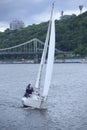 Crew yachtsmen of a sailing yacht conducting a flanking manoeuvre