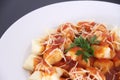 Gnocchi with tomatoe sauce parmesian isolated black background Sao Paulo Brazil Royalty Free Stock Photo