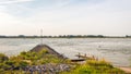 Crib built from basalt stones in a wide Dutch river