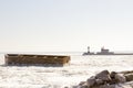 The Crib and lighthouses on pier along shipping channel on froze Royalty Free Stock Photo