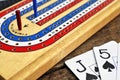 Cribbage board and playing cards