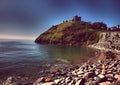 Criccieth Castle is a native Welsh castle situated on the headland between two beaches in Criccieth, Gwynedd, in North Wales, Royalty Free Stock Photo