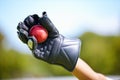 Cricket, ball and hand with a wicket keeper making a catch during a sports game outdoor on a pitch. Fitness, glove and Royalty Free Stock Photo