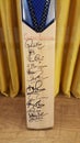 Cricket bat autographed by cricket legends