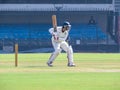 Cricket Batsman Playing Shot, Close-up photo.